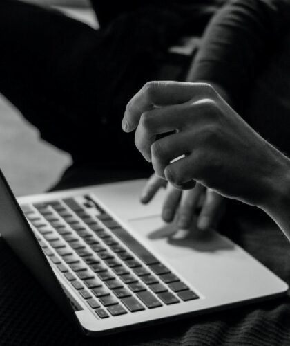 Close-Up Of Person On Laptop. Online Sustainable Marketplaces.