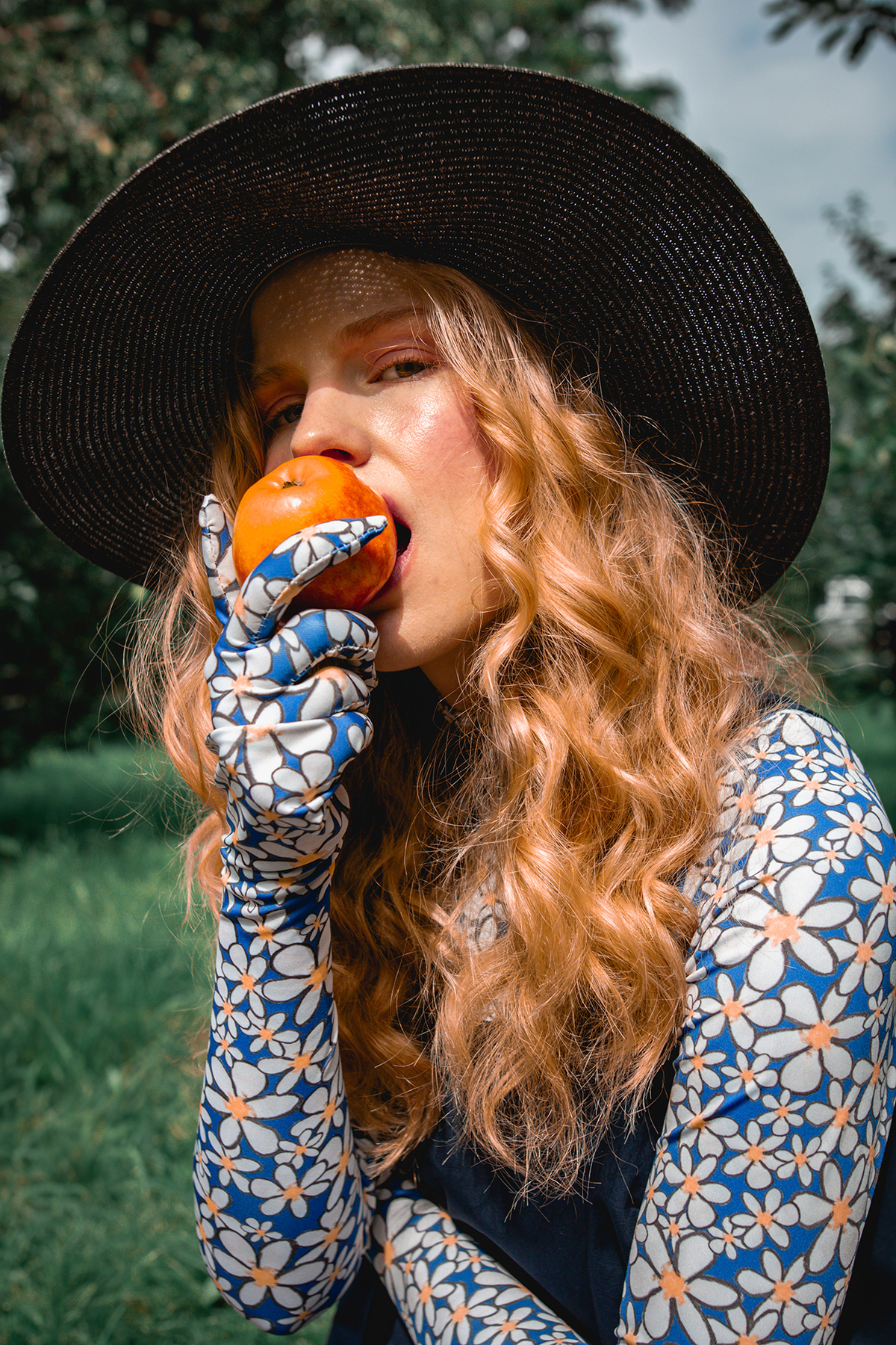 Model Eating An Apple