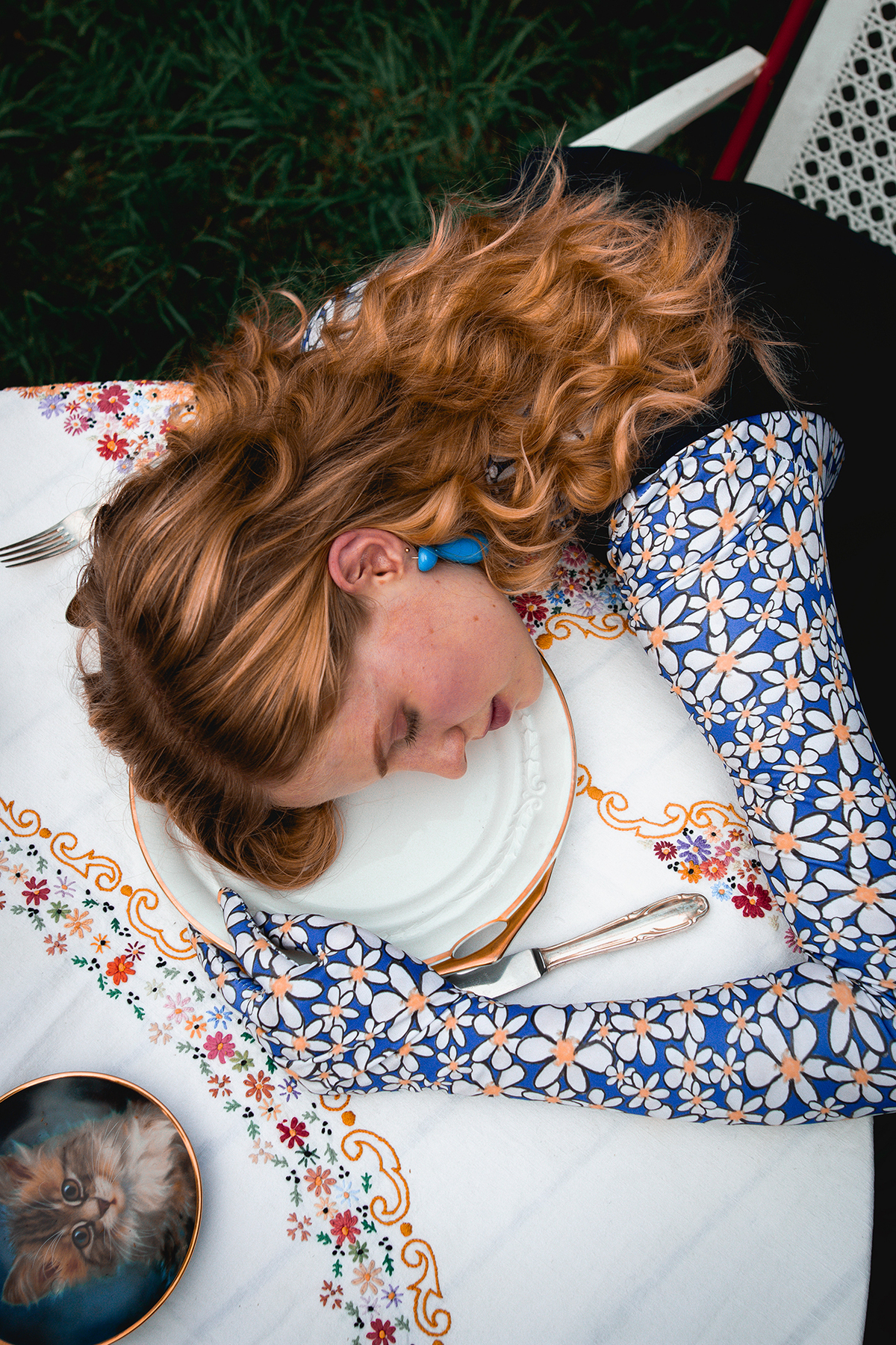 Model With Her Head Resting On A Table