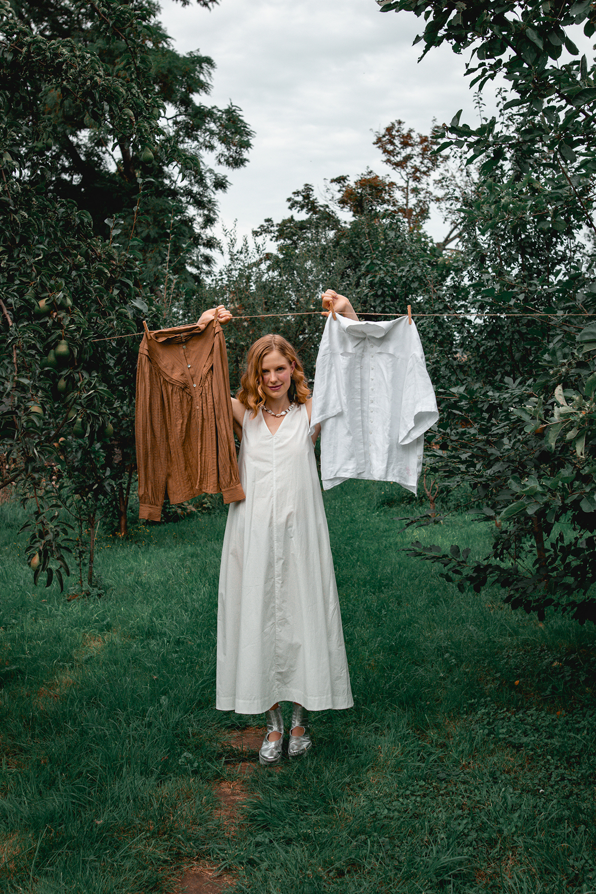 Model Posing Behind A Washing Line
