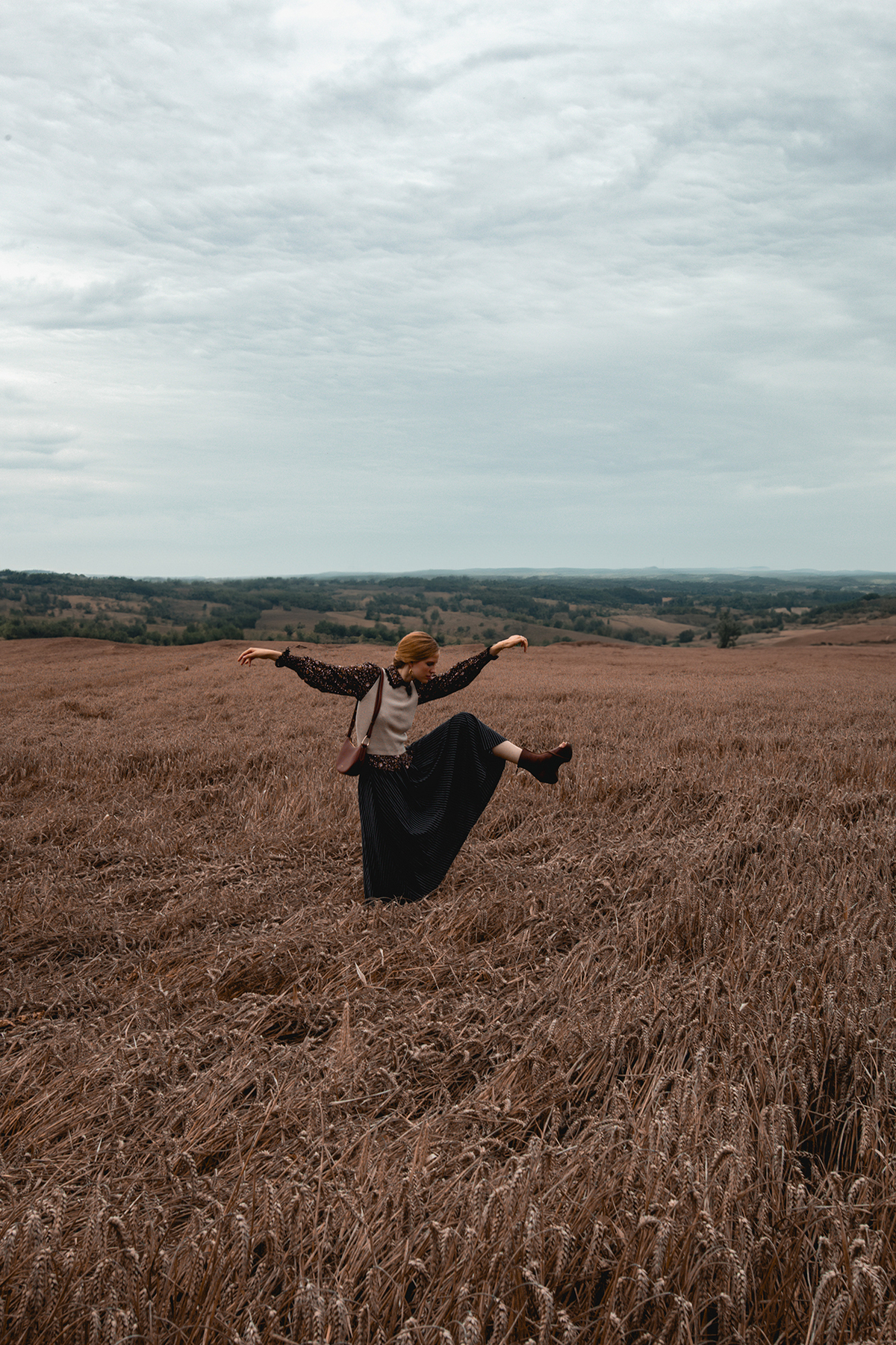 Model Dancing In A Field