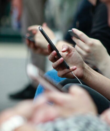 People On Their Phones. Gen-Z using Social Media.