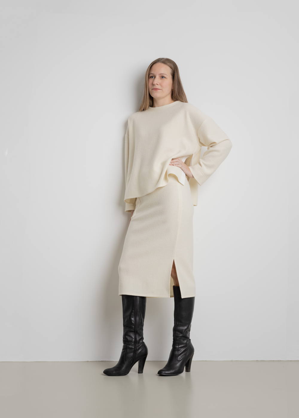 Model Wearing Frijda Juni Bio Wool Jumper and Skirt